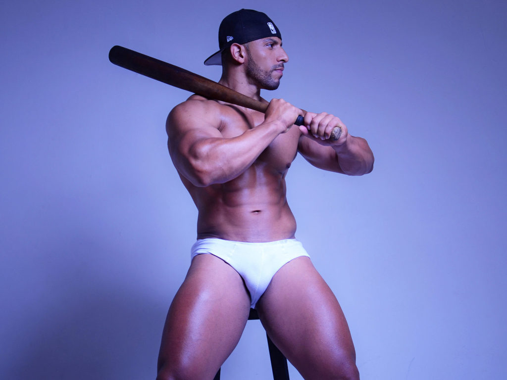 Gay cams model Werner holding a baseball bat in underwear photoshoot